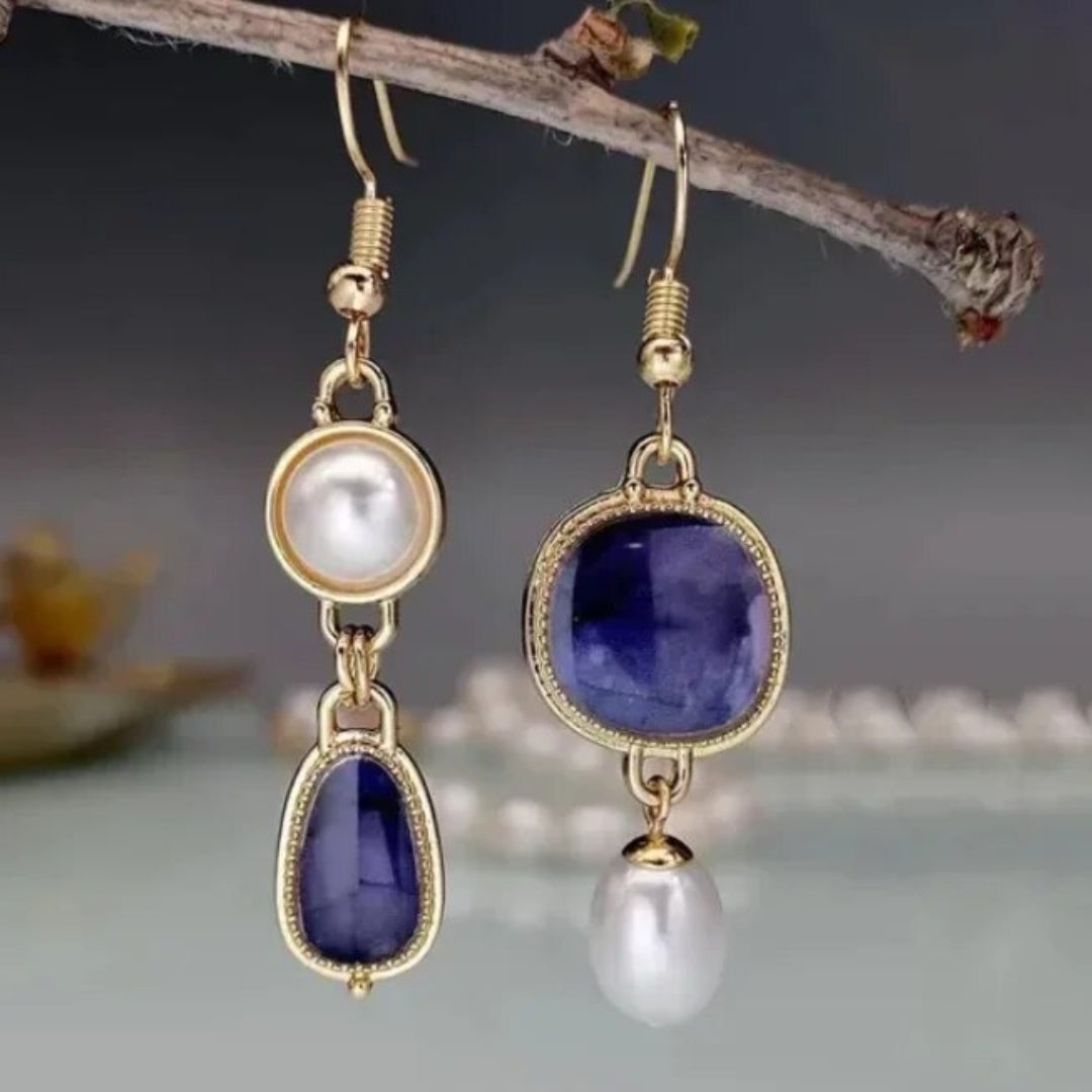 Boucles d'oreilles dorées vintage avec pierres bleues