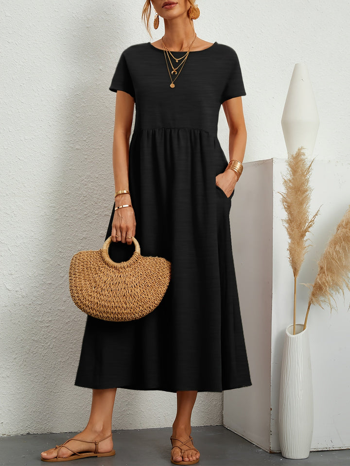Charlotte – Robe longue fluide avec taille plissée et poches