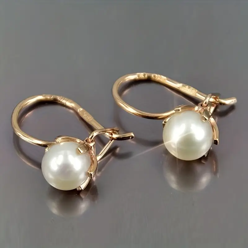 Boucles d'oreilles élégantes en perles dorées